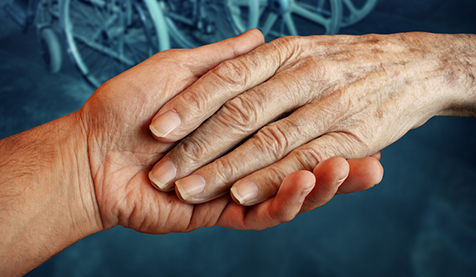 Doctor's hand on patient's hand