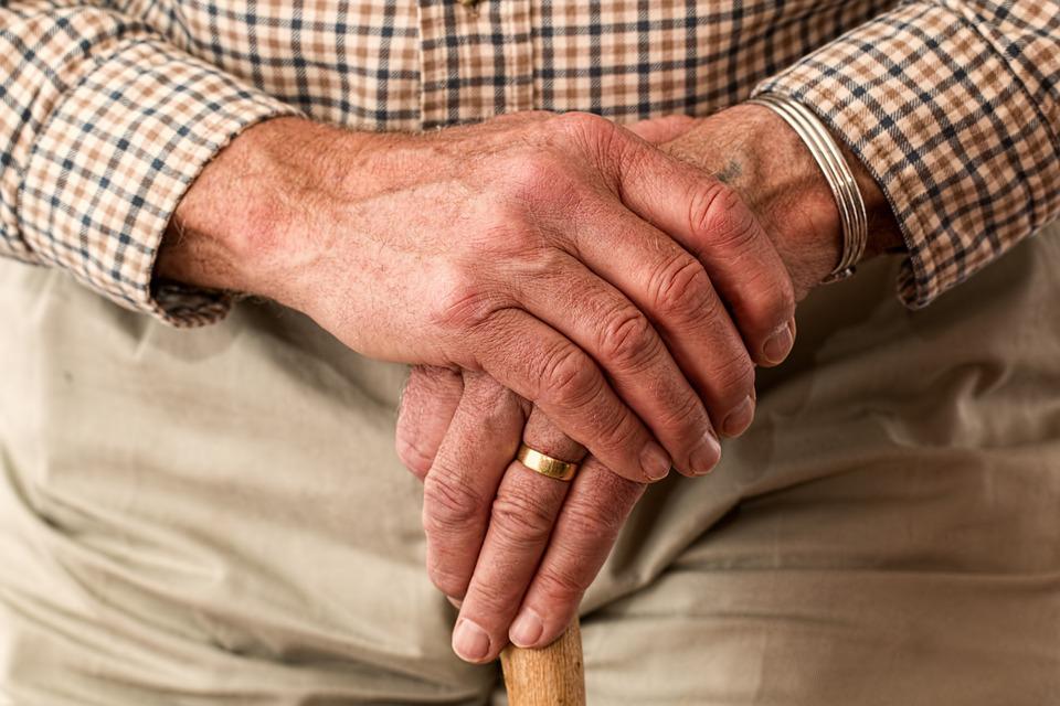 Elderly man looking worried